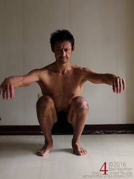Learning to do deep squats (without weight), shins rolled slightly outwards, Neil Keleher, sensational yoga poses.