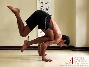 eka pada bakasana 1 (lifted leg bent) yoga poses, yoga postures, arm balancing yoga poses, arm balancing yoga postures, arm strengthening yoga poses,  abdominal strengthening yoga poses, yoga balance poses, balance exercises