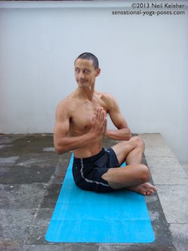 Asana Easy Twist Prayer working on thoracic mobility with spinal twists 1