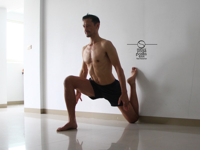 Couch stretch, a stretch for the hip flexors, in particular the rectus femoris. Neil Keleher, Sensational Yoga Poses.