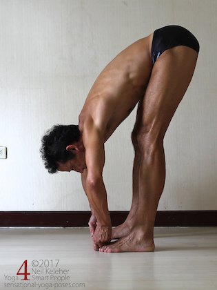 Arm strengthening standing forward bend: Grabbing the big toes and pulling. Neil Keleher. Sensational Yoga Poses.
