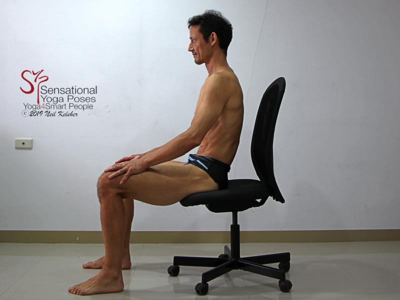 Seated Lumbar forward bending (flexion) 2, sacrum dropped so that pelvis tilts backwards and lumbar spine flattens. Note how ribcage moves rearwards relative to the pelvis. Neil Keleher, sensational yoga poses.