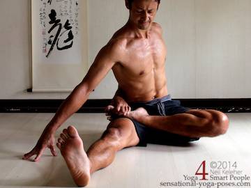 Seated bound lotus pose with one leg in lotus position and the other leg straight. Neil Keleher. Sensational Yoga Poses.