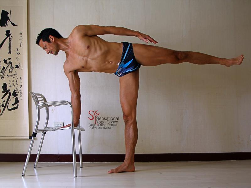 half moon pose using a chair. Neil Keleher. Sensational Yoga Poses.