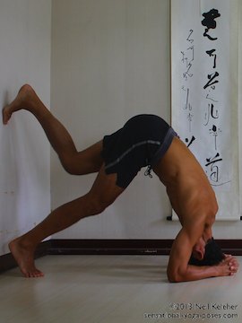 inverted yoga pose, headstand using wall