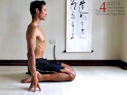 the yoga kneeling posture called hero pose, virasana (kneeling with bum between the feet while upright.) 