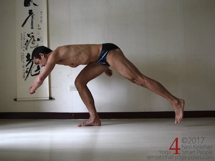 Leg strengthening exercise, reaching one leg back while standing. Neil Keleher. Sensational Yoga Poses.