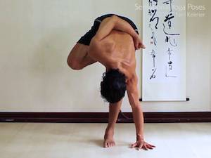 Half Bound lotus, standing forward bend. Neil Keleher, Sensational Yoga Poses.