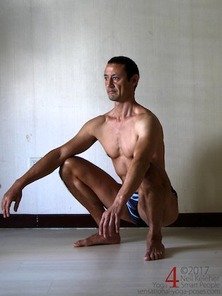 knee strengthening exercises: deep squat with feet wide and turned out.