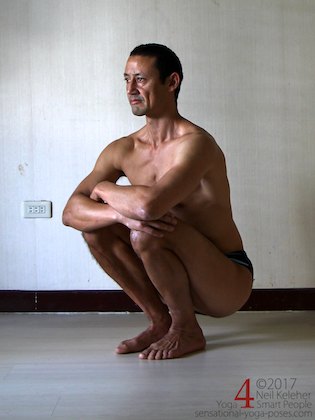 knee strengthening exercises: deep squat with feet parallel and close together. Neil Keleher, sensational yoga poses.