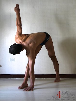 twisting triangle pose. Neil Keleher. Sensational Yoga Poses.