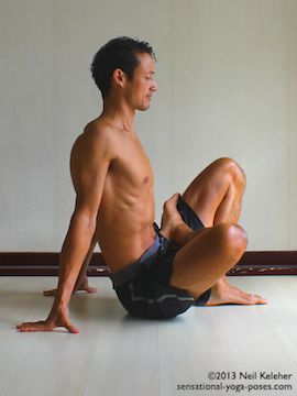 marichyasana b preparation position with one leg in lotus