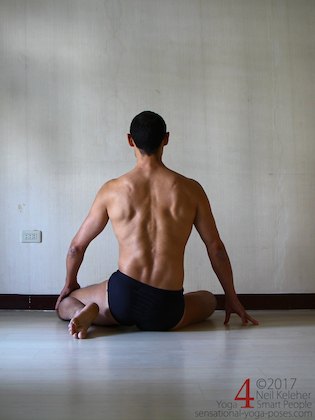 Working towards a lying quadriceps stretch with a modified single leg kneelng position. Neil Keleher. Sensational Yoga Poses.