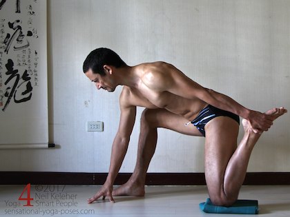 Lunging bent knee hip flexor stretching yoga pose. Neil Keleher. Sensational Yoga Poses.