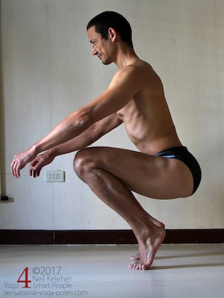 lowering into a squat with heels lifted to stretch the quads while active Neil Keleher, Sensational Yoga Poses.