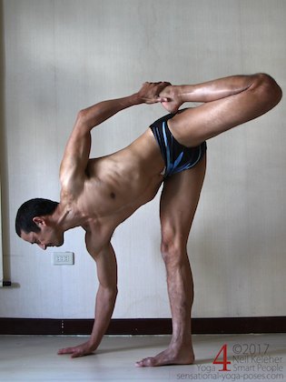 Standing quadriceps stretching pose, bending forwards.  Neil Keleher. Sensational Yoga Poses.