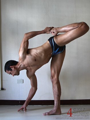 Standing quadriceps stretching pose, bending forwards.  Neil Keleher. Sensational Yoga Poses.
