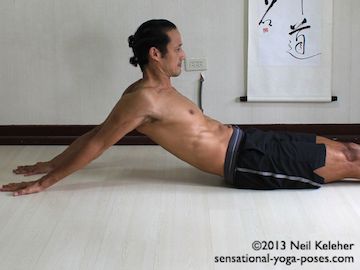 Rack pose shoulder stretch. This is a belly facing up pose with the arms down and back behind the body. Neil Keleher. Sensational Yoga Poses.