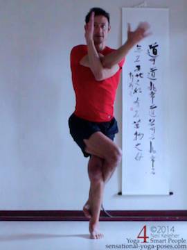 eagle pose (garudasana) wrapping the arms. yoga shoulder stretches
