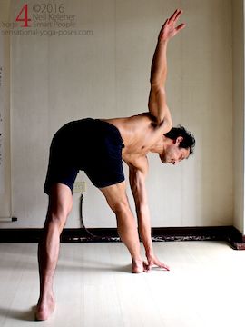 Revolved triangle, side bending prior to the twist, neil keleher, sensational yoga poses.