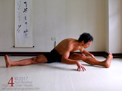 Wide leg forward bend to one leg. Neil Keleher. Sensational Yoga Poses.