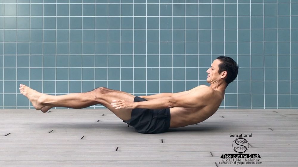 From supine reaching the legs forwards in order to lift the upper body off of the floor. This is a preparation exercise for straight leg situps. Neil Keleher, Sensational Yoga Poses.