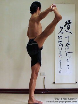Sensational Yoga Poses, Model Neil Keleher. balancing on one leg in utthitta hasta padangusthasana with leg to the side while holding onto big toe.