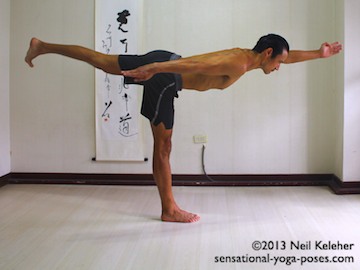 Sensational Yoga Poses, Model Neil Keleher. balancing on one leg in warrior 3 with the lifted leg side arm reaching forwards. The other arm is back.